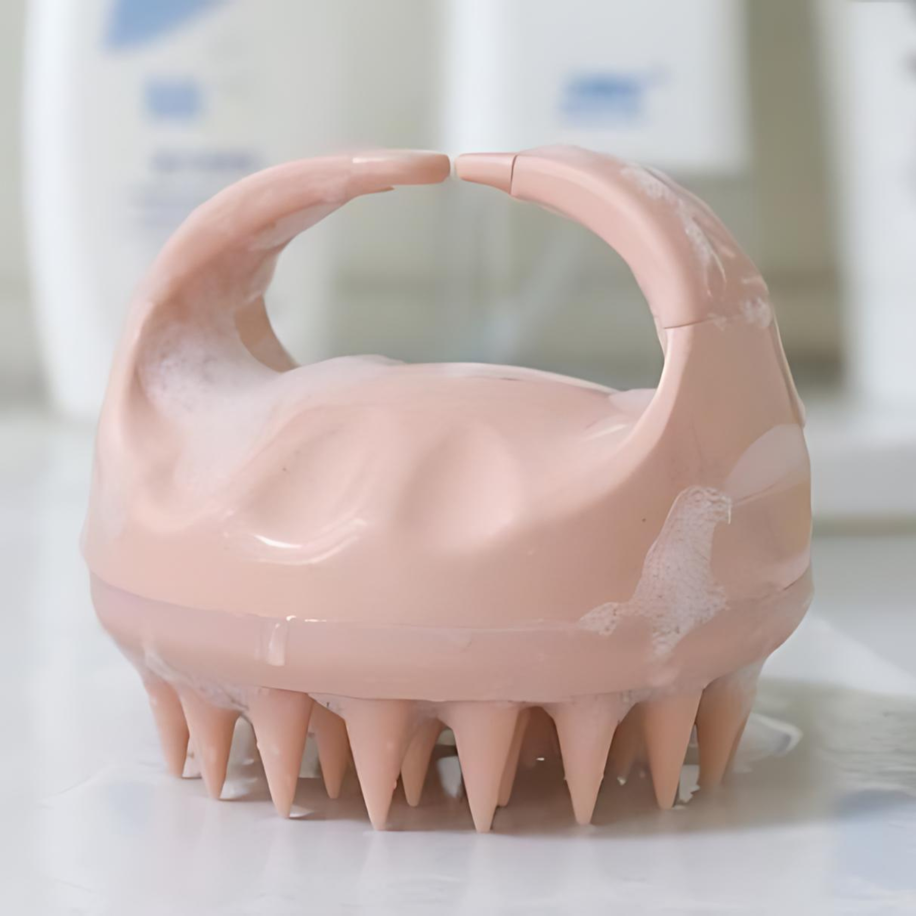 Scalp Massager Scrubber Brush for increasing hair thickness by stretching the cells of hair follicles, dislodging dead skin cells and boosting immune function in pink color