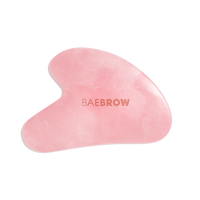 Rose Quartz Gua Sha Sculpt Tool for lifting and contouring face muscles reducing wrinkles and stimulating lymphatic drainage in light pink color 